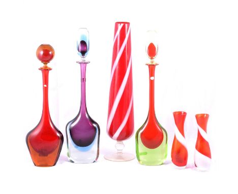 Three Murano glass bottles with stoppers, 49cm and smaller, and three Italian glass vases with red and white decoration.Qty: 