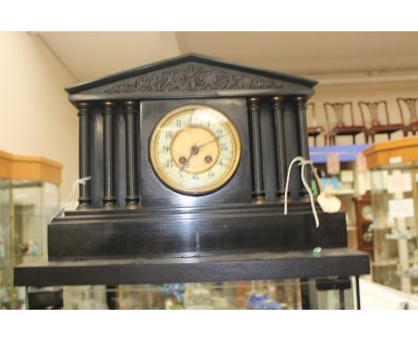 A German slate mantle clock, early 20th Century, complete with key