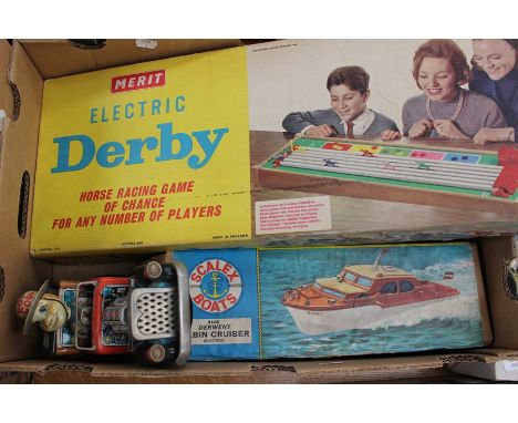 A Triang, Derwent Cabin Cruiser, contained within original box; together with a boxed Merit Electric Derby horse racing game;