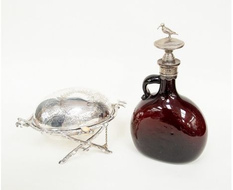 A 19th Century glass flask with a white kiwi finial and a Victorian plated revolving butter dish (2)