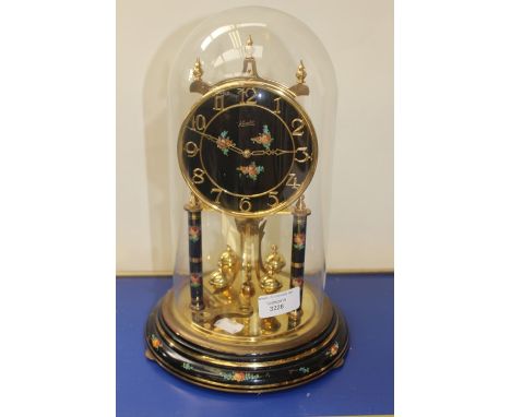 Kundo anniversary clock, 20th Century with floral detail