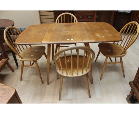 Ercol Drop leaf dining table and four chairs.