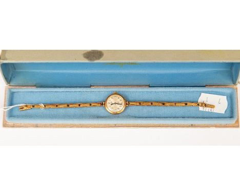 A 9ct gold Rotary ladies watch, circa 1940's, round silvered dial, dial diameter approx 16mm, on 9ct gold expander bracelet, 