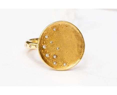 An 18ct gold and diamond ring, by Links of London, disc shaped form interspersed with small flush set diamonds, diamond set s