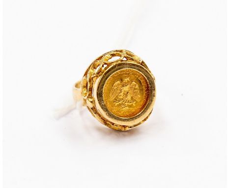 A two pesos coin ring, 1945, mounted in 9ct gold, fancy scrolling mount, size K, total gross weight approx 6.9 grams