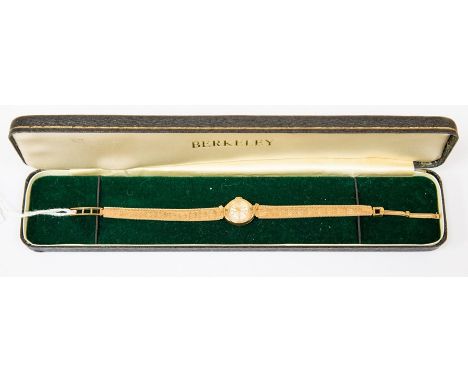 A 'K' Incabloc 9ct gold case ladies watch, round dial, batons, champagne dial, on fancy link 9ct gold strap, total gross weig