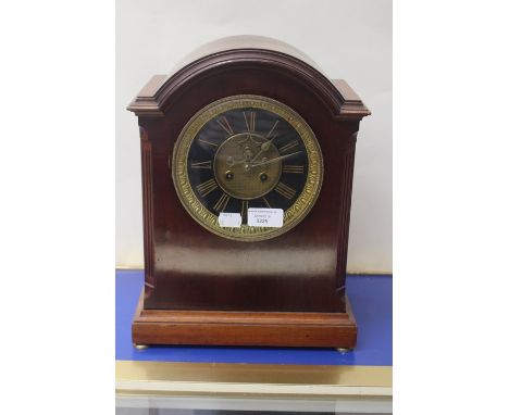 Mahogany cased 8 day mantle clock, hourly and 1/2 hour strike