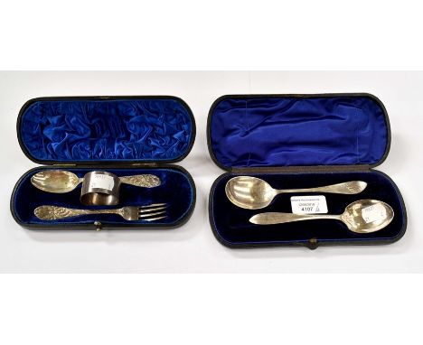 Cased christening set of fork, spoon and napkin ring together with another presentation box containing two plated spoons (2)