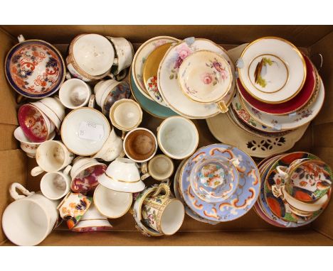 A collection of assorted British and Continental ceramic miniature cups and saucers