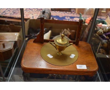 Early 20th Century light oak inkstand with brass pen rest and trophy shaped inkwell&nbsp;