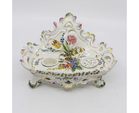 19th Century Continental Chaise Form ink stand, with floral detail to centre, plus a sander and inkwell to centre on four leg