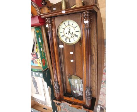 A late 19th Century drop pendulum wall clock, in mahogany case, approx 130 cms long, A/F