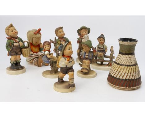 Collection of mid 20th Century Hummel figurines of boy and girls, along with a West German small vase