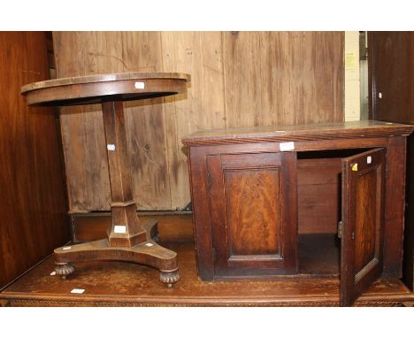 Wine table on pedestal with tripod base and small cupboard.&nbsp;