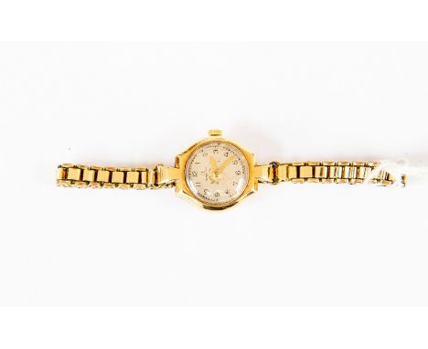 An Omega ladies 9ct gold cased bracelet watch, circa 1940's, round dial,&nbsp; with later rolled gold bracelet