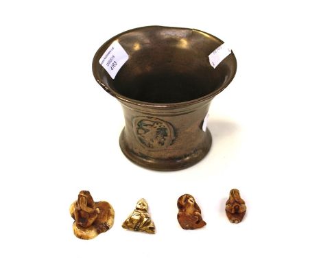 An Oriental ivory netsuke, carved as three monkeys, See no Evil, Hear no Evil and Speak no Evil, height 4cm and An oriental i
