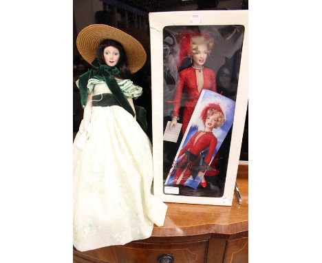 Franklin Mint boxed Marilyn Monroe portrait doll from Gentlemen Prefer Blondes and Franklin Mint Scarlett O'Hara doll on stan