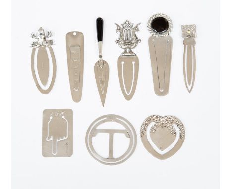 A Tiffany sterling silver bookmark, round with central T shape, an English hallmarked heart shaped bookmark, a rectangular on