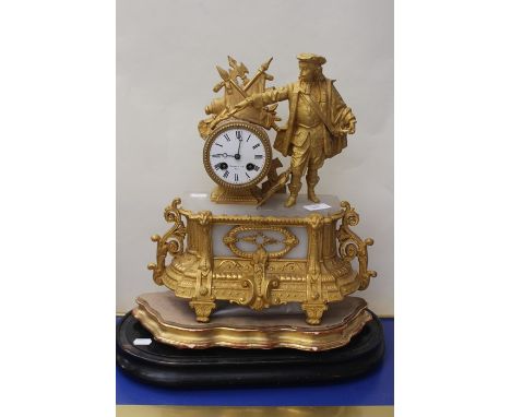 &nbsp;A late 19th Century French gilt metal and onyx bracket clock, surmounted with Louis XVI figure in 18th Century costume,