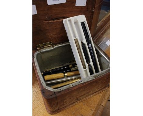 Mahogany and feather strung tea caddy together with seven fountain pens, including Waterman etc&nbsp;