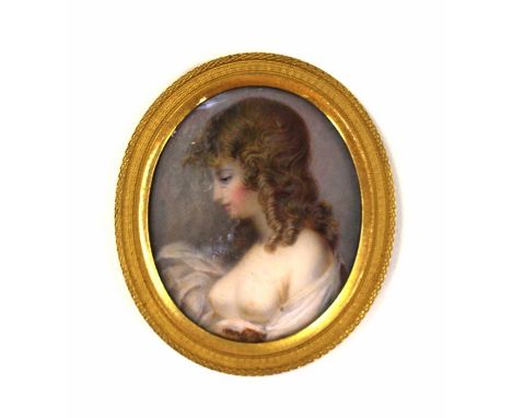 An Associated Georgian portrait miniature, painted on Ivory, scantily clad LadyThe circular mount is ormolu