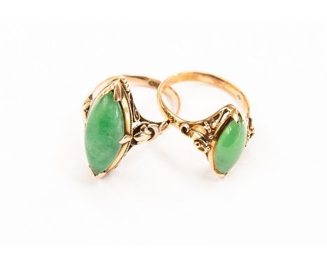 Two 14ct gold and nephrite jade set rings, comprising a&nbsp; marquise cut jade set version within a fancy scroll and foliate
