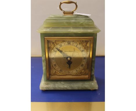 A mid 20th Century green onyx mantle clock, with made in Belgium on reverse, retailed by Swansea Goldsmith