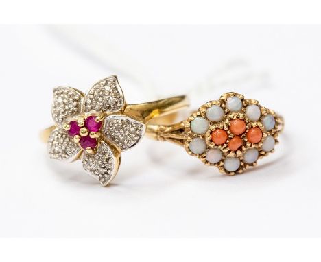 An opal and coral set dress ring, 9ct gold, comprising four round coral set to the centre with opal border, size P, total gro