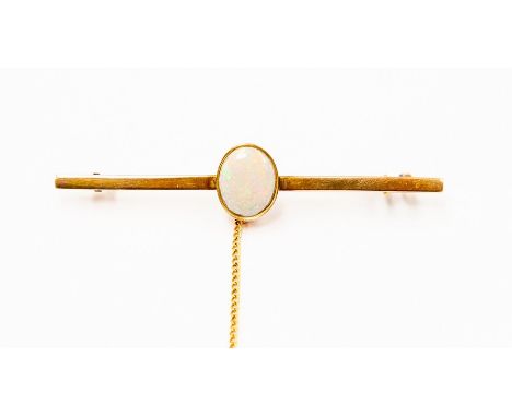 A 9ct opal brooch, having oval cabochon opal, size approx 11mm x 8mm, , with safety chai, total gross weight approx 5.8gms