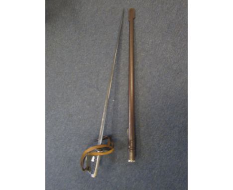 Sword: A fine 1897 Pattern Geo V Infantry Officers sword in its leather field service scabbard. Top of blade numbered 'M7290'