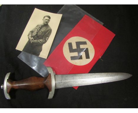 German WW2 SA Dagger (no scabbard) blade worn, maker marked (worn) cross guards stamped 'Nm'. Plus a Nazi Armband, and a Hitl