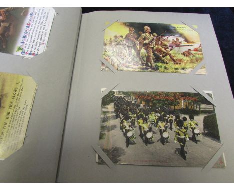 Military - interesting selection of real photo and printed military postcards housed in a red album. Selection includes WW1 m