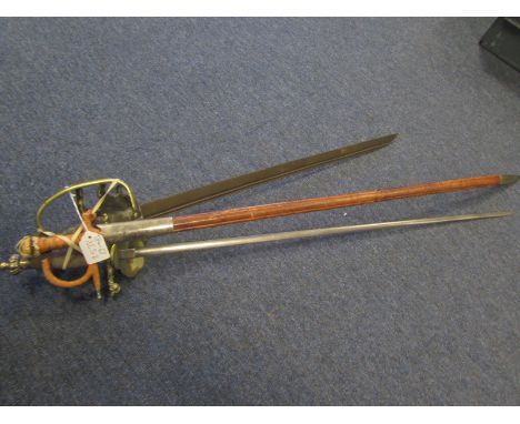 Swords: 1) a (tourist?) quality Spanish Bullfighters sword. Traditional hilt (quillon broken & present). In its steel mounted