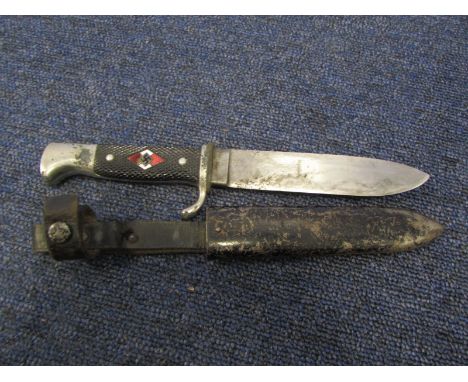 German WW2 Hitler Youth dagger with scabbard and leather strap, blade maker marked 'RZM M7/37 1939'. Enamel chipped to HY dia