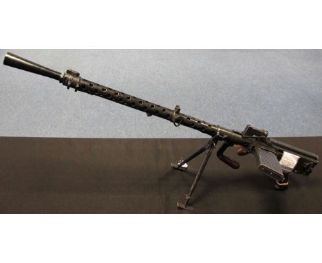 Machine Gun: A NAZI MG-13 light machine gun with flash hider. Cal 7.92mm. De-act in 1996. No visible markings. Action operate