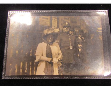 Mrs Drummond (?) with policeman R/P   (1)