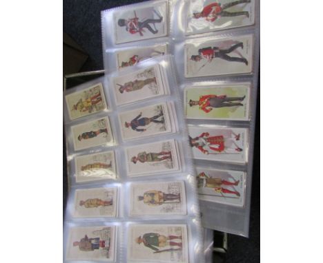 Tin of various Cigarette card sets/part sets in sleeves inc Regimental Standards & Cap Badges, RAF Badges, Army Badges, Allie