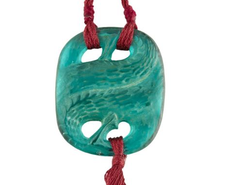 René Lalique (French 1860-1945), ‘Serpents’ No.1651 a sea-green glass pendant,  Designed 1920, engraved on the reverse 'R. La