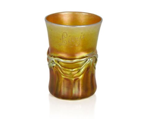 Louis Comfort Tiffany (American 1848-1933), a 'Favrile' iridescent glass Christening beaker inscribed ‘Lizzie’, Date code for