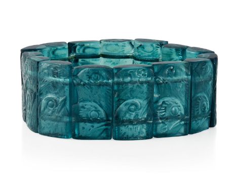 René Lalique (French 1860-1945), ‘Poussins’ No.1330 a dark green glass bracelet,Designed 1928, the top edges of two segments 