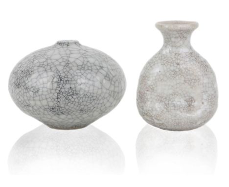 Otto and Vivika Heino (American), two raku vases, c.1990, each with hand incised signatures to base,A white crackle glazed va