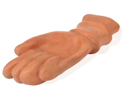 Jean Marais (French 1913-1998), a terracotta vide poche,c.1960, signed 'Jean Marais',Modelled as an upturned hand with closed