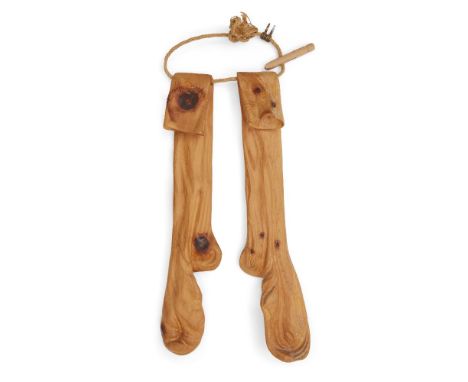Livio De Marchi (Italian b.1943), a pine carving of a pair of stockings,c.1990, each with hand worked signature to reverse,Ca