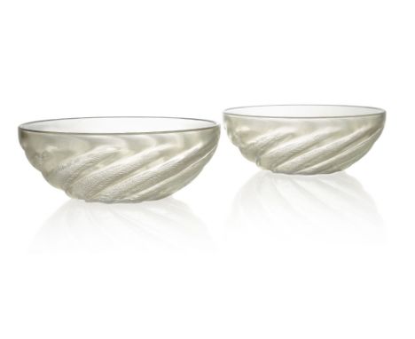 René Lalique (French 1860-1945), ‘Poissons No1’, No.3211, a pair of opalescent bowls, Designed 1921, moulded R. Lalique,Mould