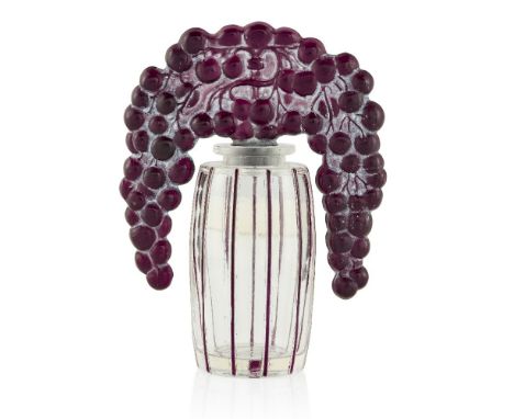 René Lalique (French 1860-1945), ‘Bouchon Cassis’ No.494 a glass perfume bottle with ‘Tiara’ stopper and white staining, Desi