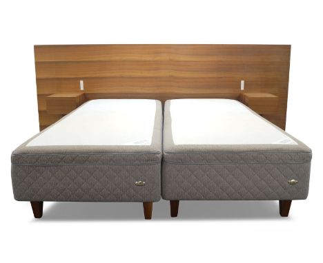 John Pawson CBE (British b.1949), a bespoke walnut bed, c.2015,The backboard with with two drawers and fitted with electrical