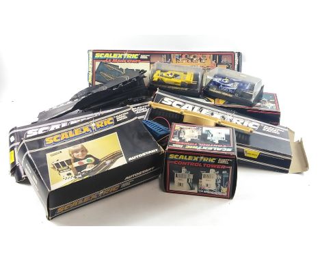 Vintage SCALEXTRIC to include a C702 control tower,   C1111 High Hump Bridge, a C700 Dunlop Bridge, a C248 Hump Bridge, a C18