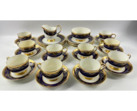 Rare to find - a part PARAGON tea service in a rich blue and gilt pattern to include 10 cups, 10 saucers, 10 side plates, 1 m