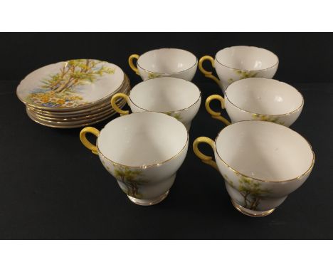A vintage SHELLEY 'Daffodil Time' tea service consisting of 6 cups and saucersApprox 12 pieces