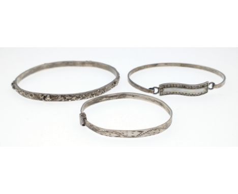 Three VINTAGE silver stamped bangles, the larger one Birmingham stamped 925 7cm diameter 16.10g weight, a nice mother of pear